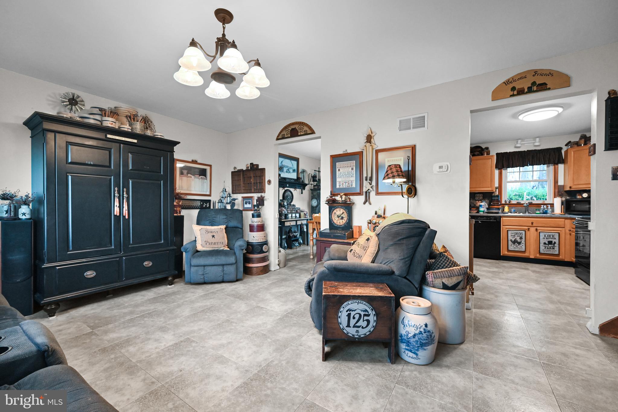 2697 Stoverstown Road Spring Grove, PA 17362 - Photo 3 of 38 a living room with furniture and a flat tv screen