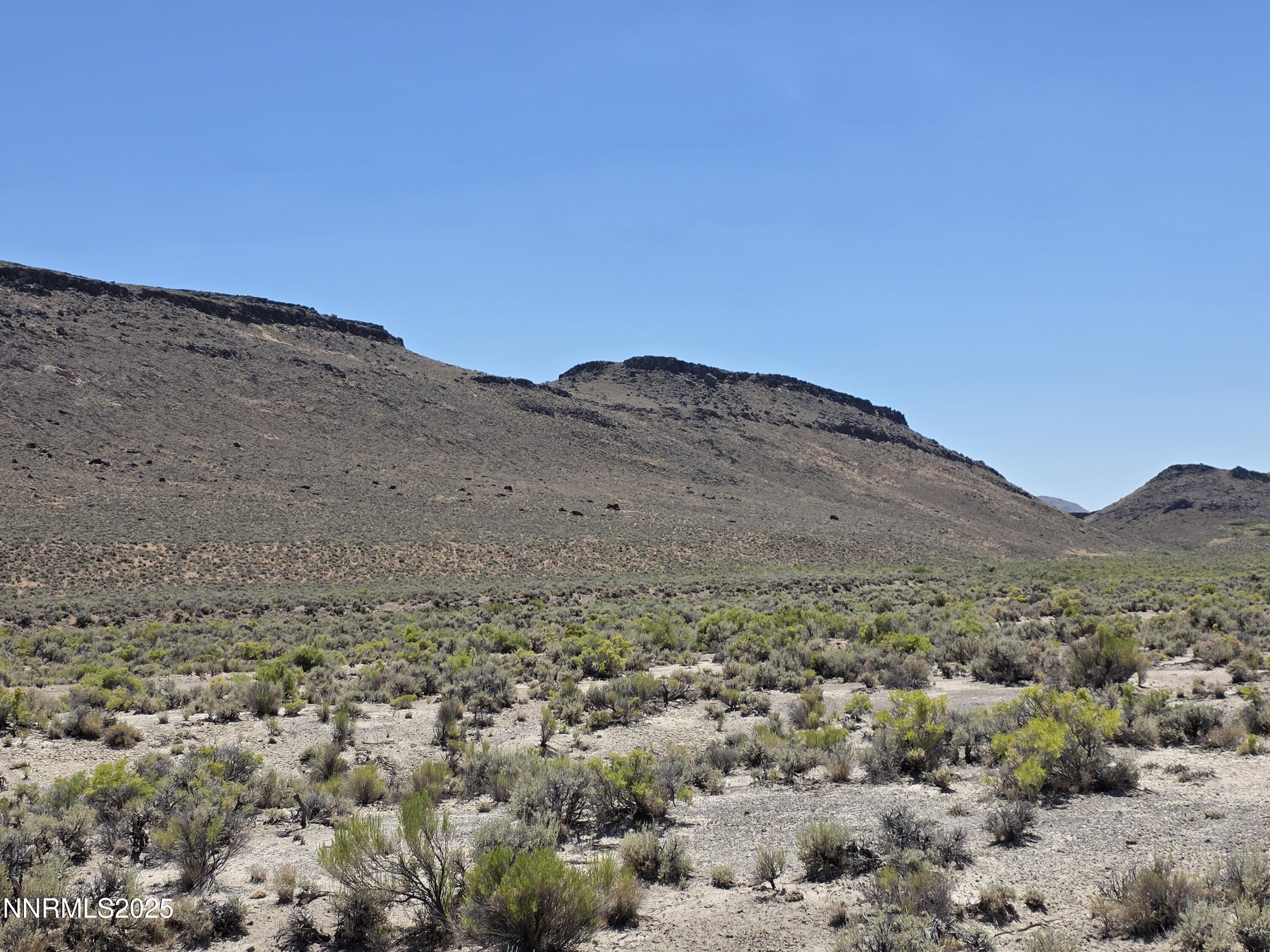 3304 High Rock Road, Unit HIGH ROCK ROAD APPROX 4 2 MILES Reno, NV 89510 - Photo 18 of 49 a view of a dry field