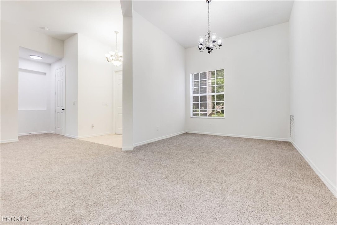 20340 Foxworth Circle Estero, FL 33928 - Photo 8 of 39 a view of an empty room with a window