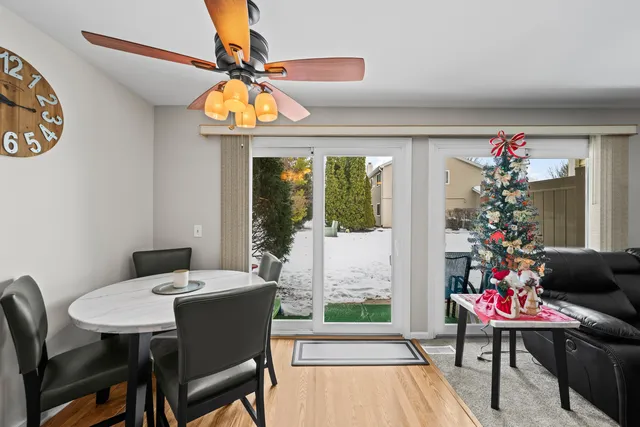 a view of a dining room with furniture window and outside view