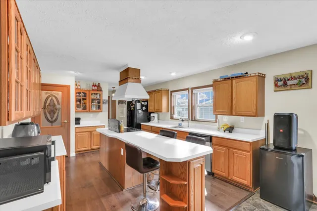 a bedroom with a bed and flat screen tv