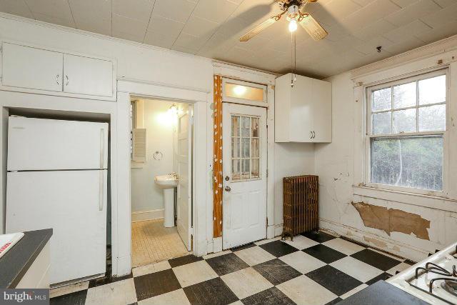 8402 Liberty Road Baltimore, MD 21244 - Photo 24 of 26 a view of a refrigerator and window