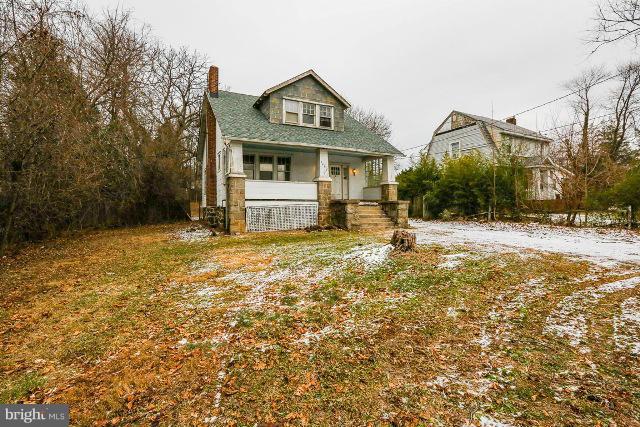 8402 Liberty Road Baltimore, MD 21244 - Photo 26 of 26 a front view of a house with a yard