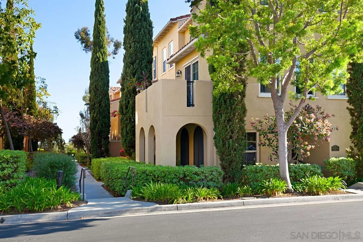 2248 Huntington Point Road, Unit 80 Chula Vista, CA 91914 - Photo 3 of 31 front view of a house with a garden