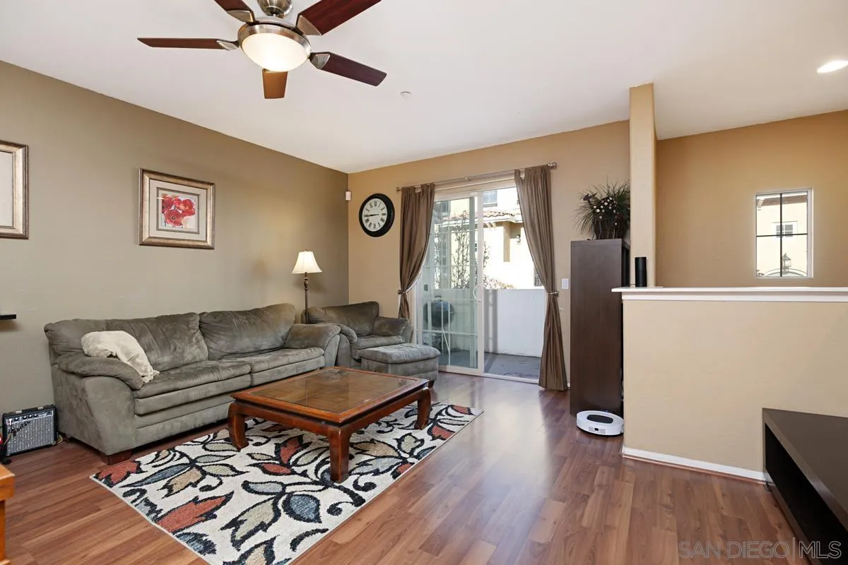 2248 Huntington Point Road, Unit 80 Chula Vista, CA 91914 - Photo 8 of 31 a living room with furniture and a wooden floor
