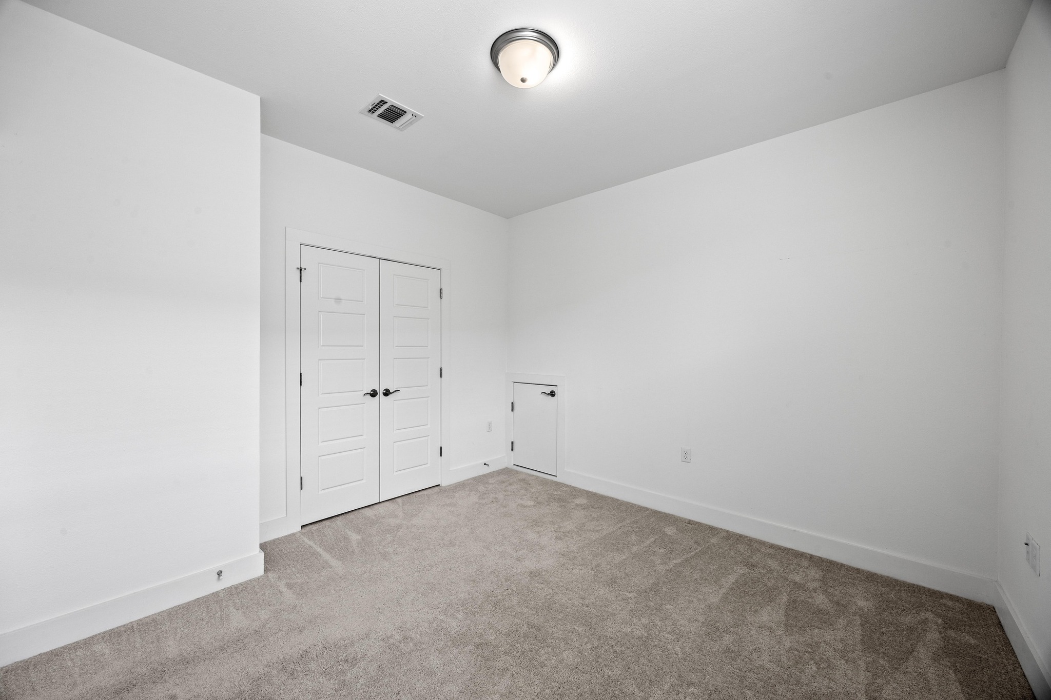 2222 Simond Avenue, Unit E Austin, TX 78723 - Photo 18 of 28 Upstairs secondary bedroom.