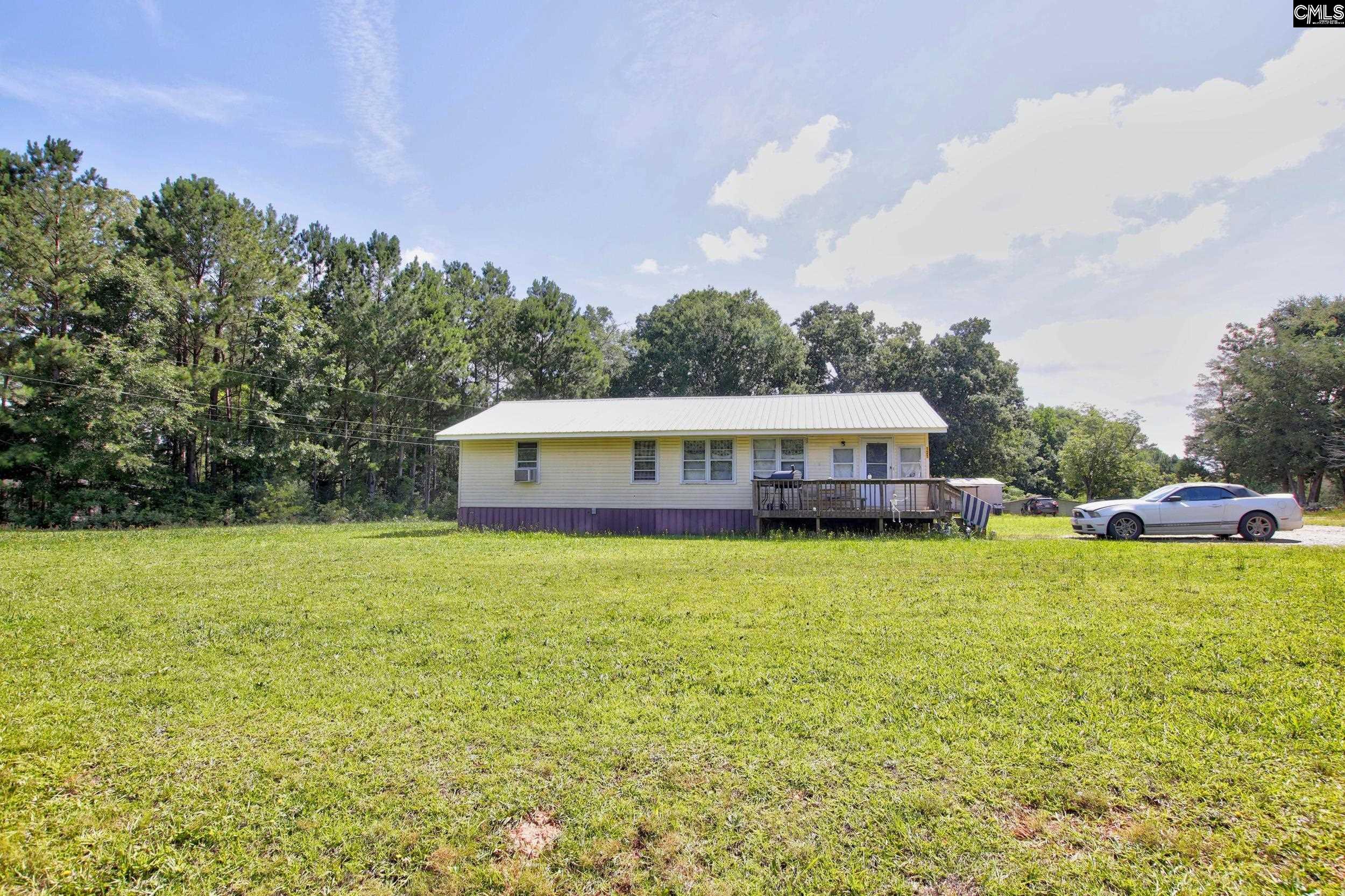 3140 Highway 702 Chappells, SC 29037 - Photo 31 of 39 a house view with a garden space