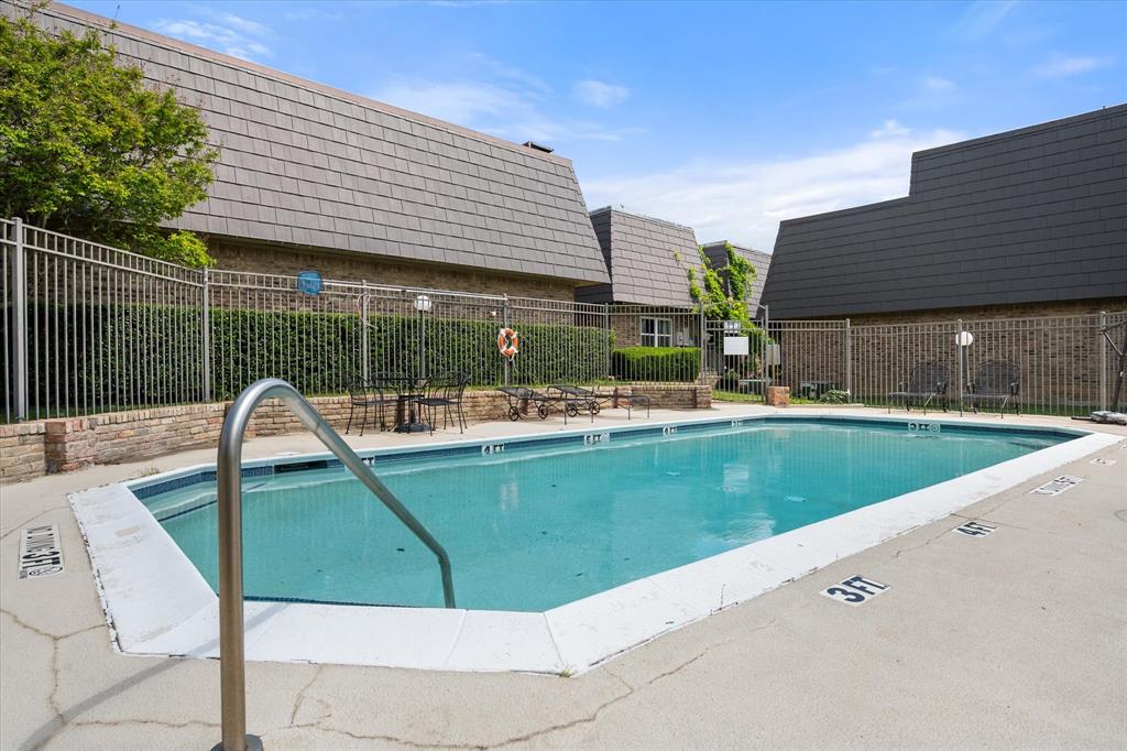 207 East Harwood Road, Unit 10 Euless, TX 76039 - Photo 33 of 34 a view of a swimming pool with a patio