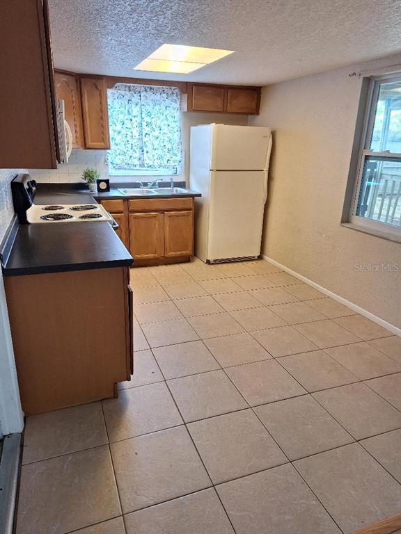 8253 Saybrook Drive Port Richey, FL 34668 - Photo 8 of 21 KITCHEN