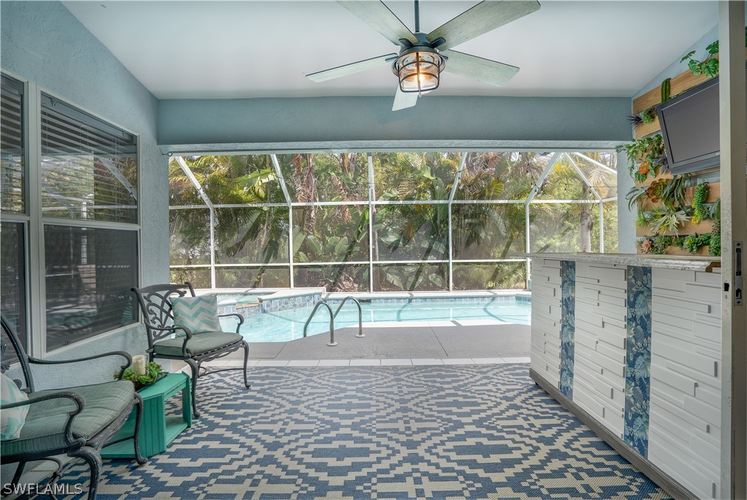 18367 Tulip Road Fort Myers, FL 33967 - Photo 3 of 13 a view of a porch with furniture