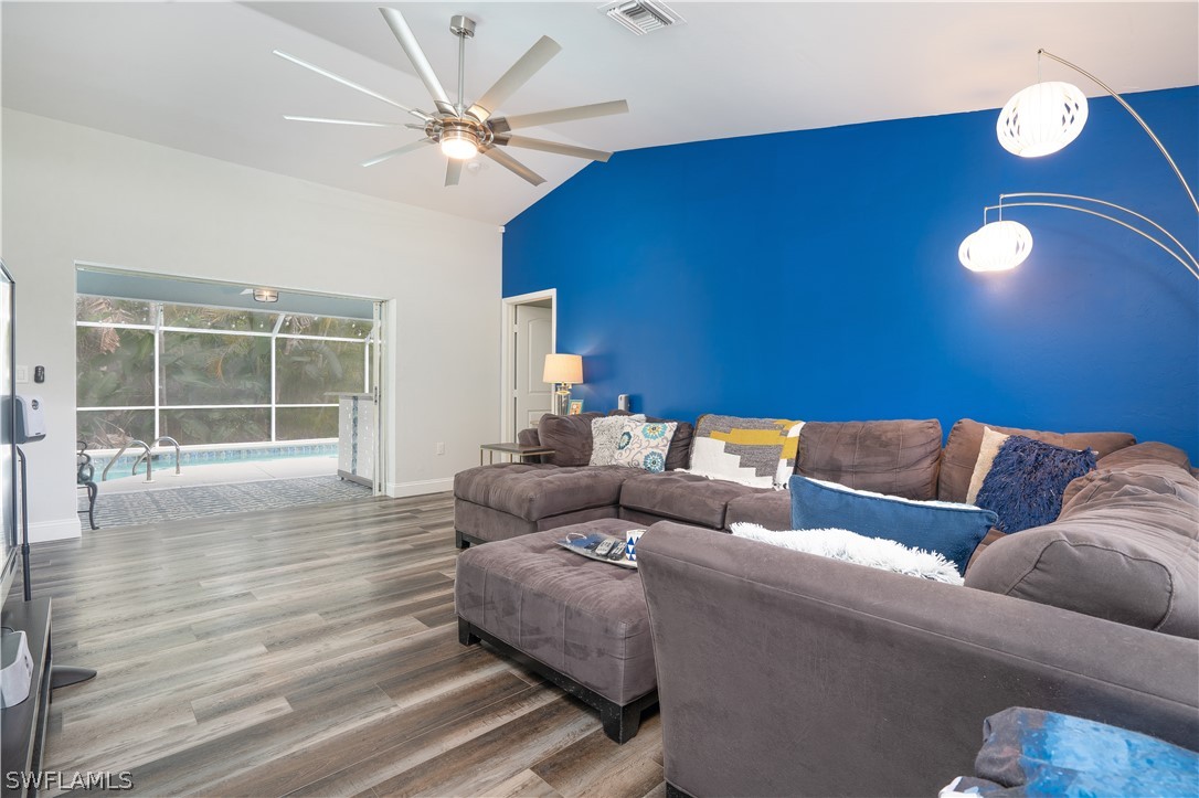 18367 Tulip Road Fort Myers, FL 33967 - Photo 4 of 13 a living room with furniture and a large window