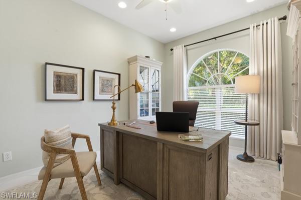 2026 Merlin Court Naples, FL 34105 - Photo 20 of 43 a view of a livingroom with furniture and a window