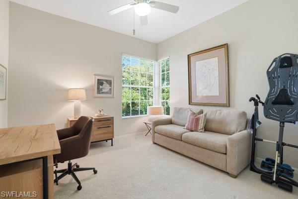 2026 Merlin Court Naples, FL 34105 - Photo 31 of 43 a living room with furniture and a window