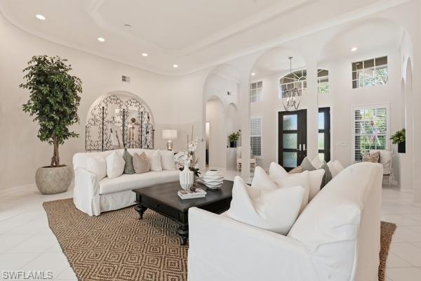 2026 Merlin Court Naples, FL 34105 - Photo 7 of 43 a living room with furniture