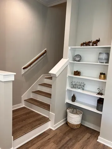 a view of storage and utility room with racks on the wall