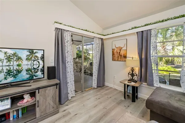 a kitchen with stainless steel appliances a sink stove and cabinets