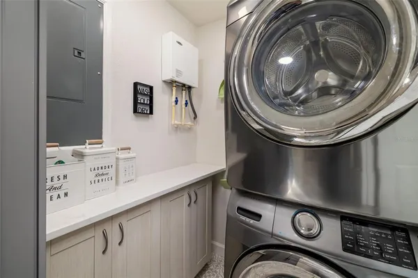 a bedroom with baby bed toys and a window