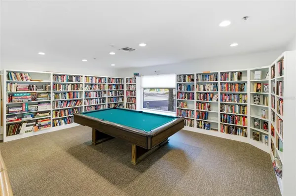 a room with furniture and gym equipment