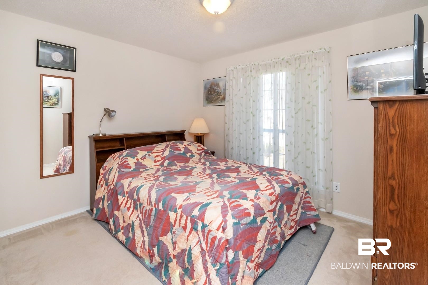 8221 Woodbend Drive Semmes, AL 36575 - Photo 24 of 35 Bedroom with light carpet