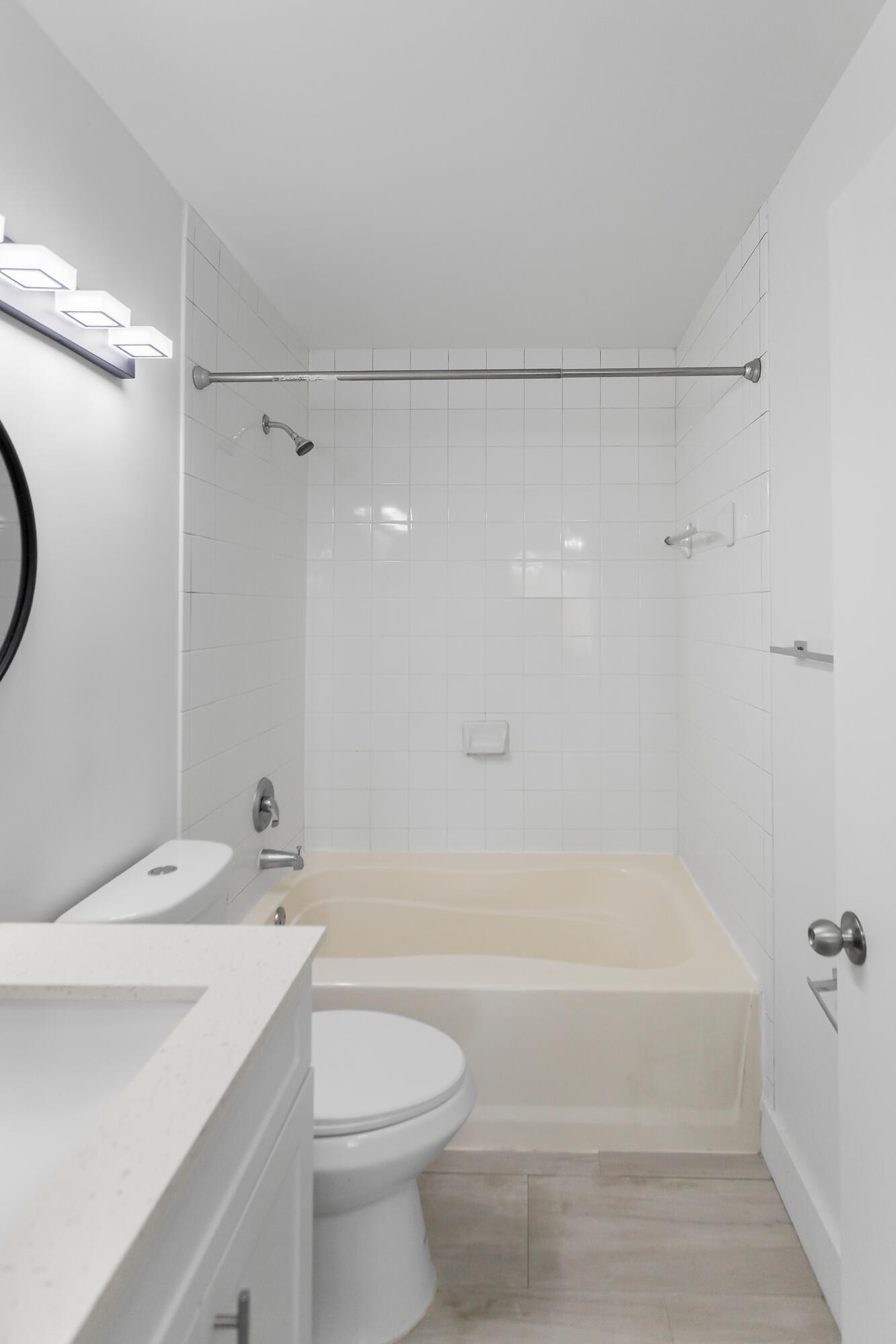 2113 Renaissance Boulevard, Unit 306 Miramar, FL 33025 - Photo 43 of 59 a bathroom with a sink a toilet and shower