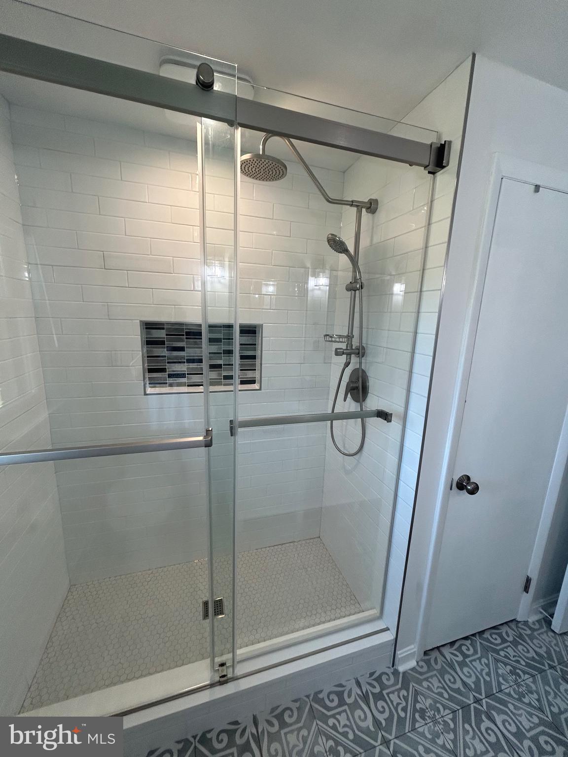 2642 Canada Hill Road Myersville, MD 21773 - Photo 20 of 33 a bathroom with a glass shower door