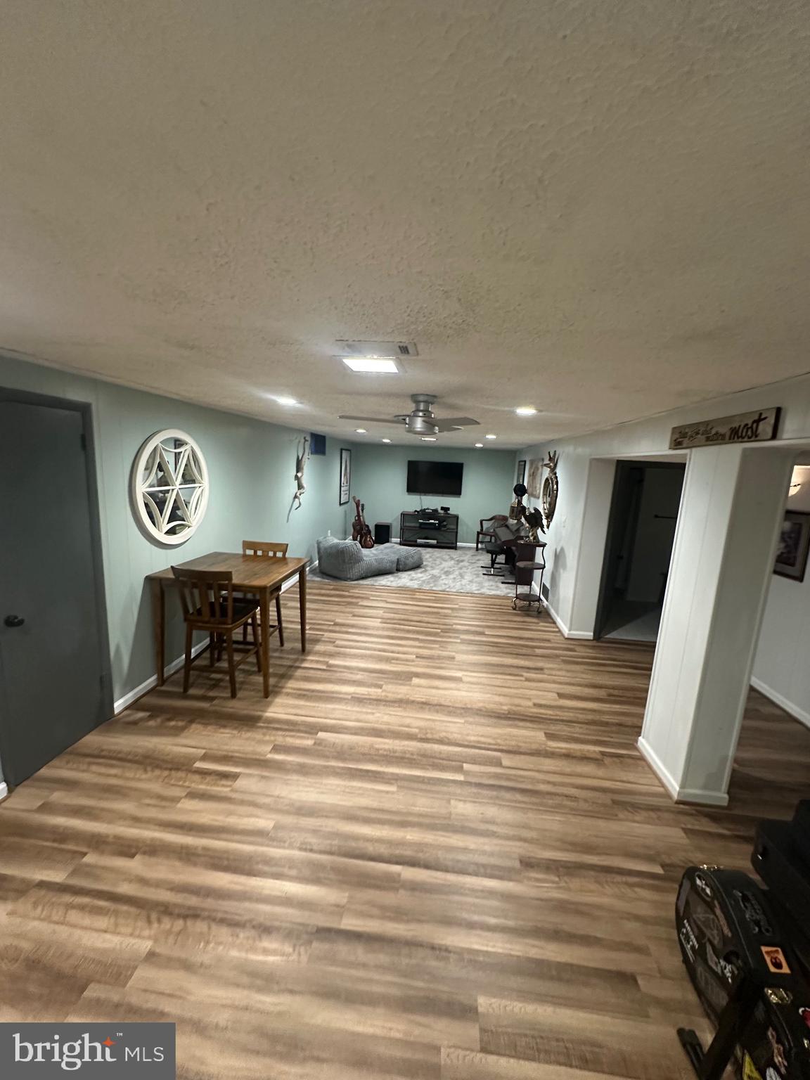 2642 Canada Hill Road Myersville, MD 21773 - Photo 22 of 33 a view of a room with furniture and a flat screen tv