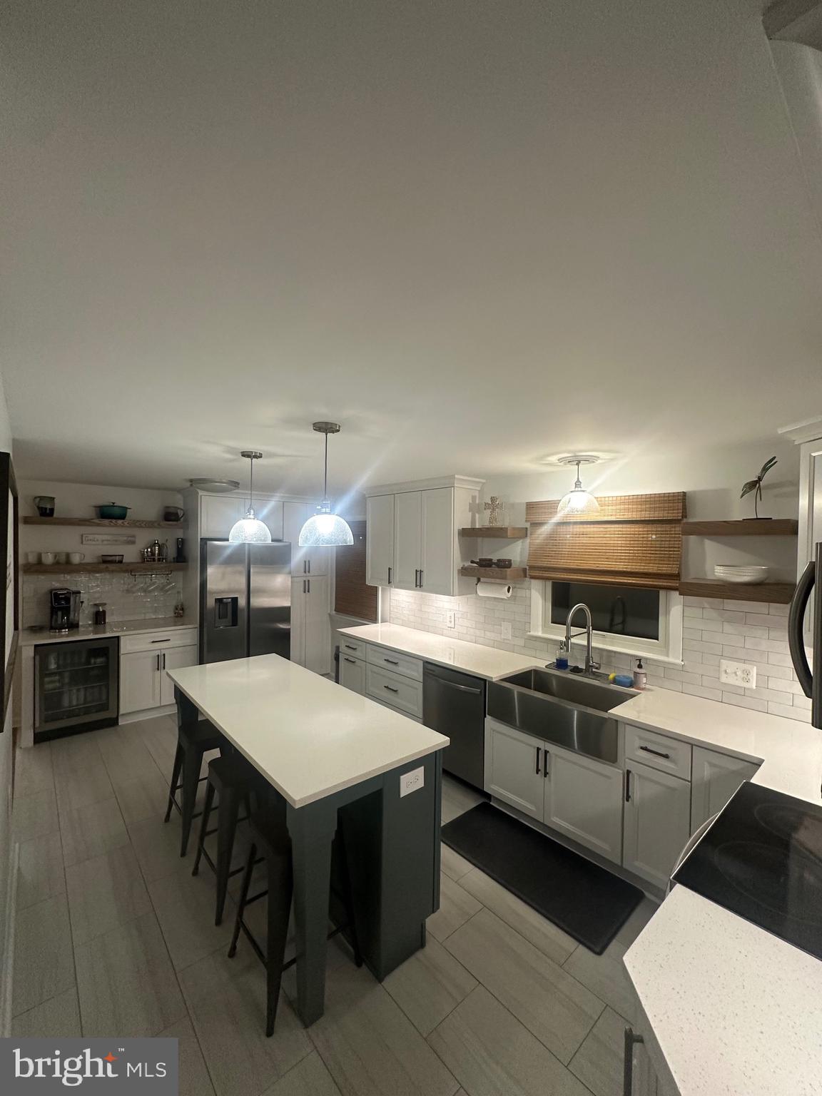 2642 Canada Hill Road Myersville, MD 21773 - Photo 6 of 33 a kitchen with appliances a sink and cabinets