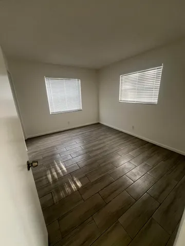 a view of an empty room and window