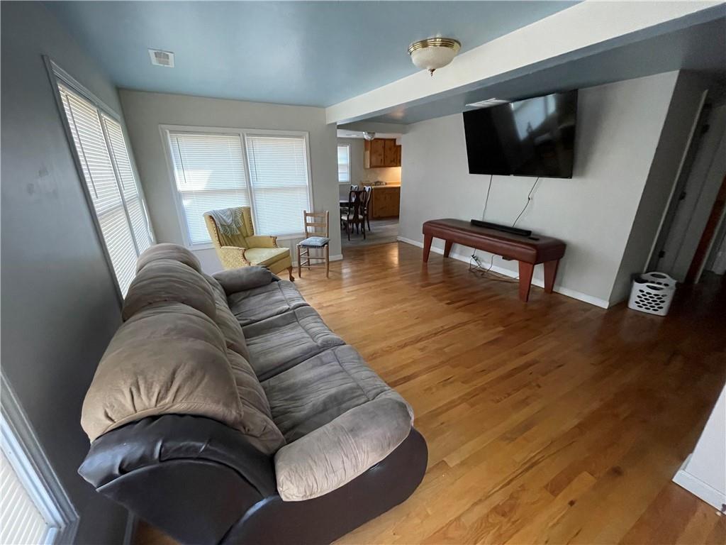 71 McGuire Road Dallas, GA 30157 - Photo 12 of 26 a living room with furniture and a flat screen tv