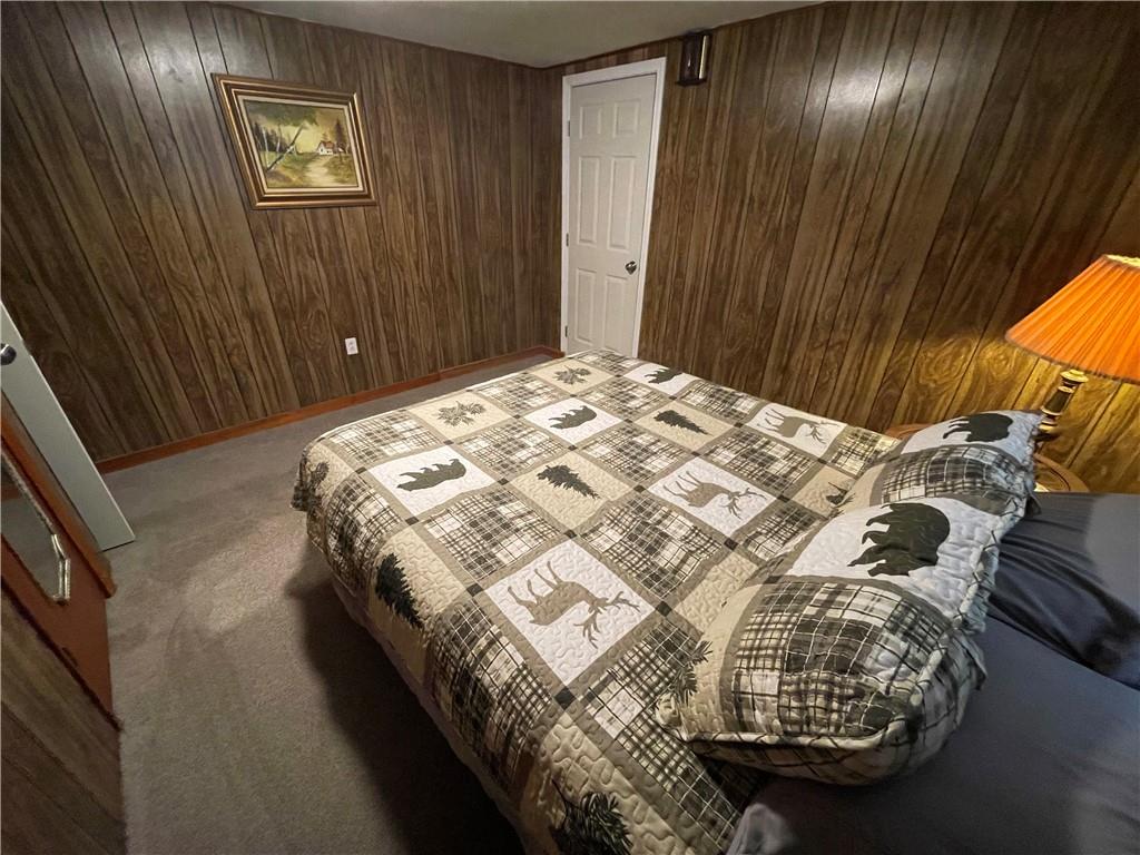 71 McGuire Road Dallas, GA 30157 - Photo 10 of 26 a bedroom with a bed and a window