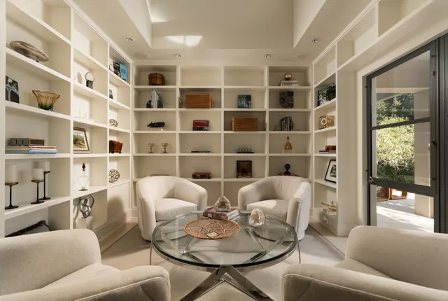 a bathroom with a granite countertop sink mirror and a bathtub