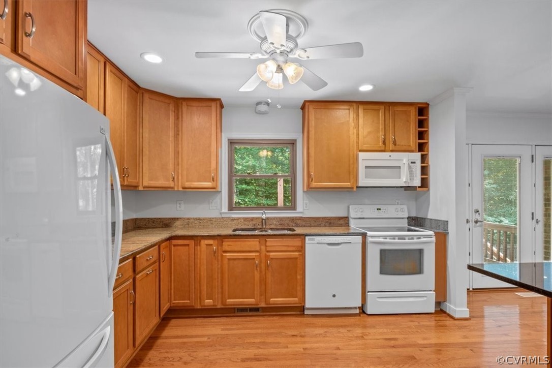 13919 Barnes Spring Road Midlothian, VA 23112 - Photo 11 of 25 a kitchen with a sink stove and cabinets