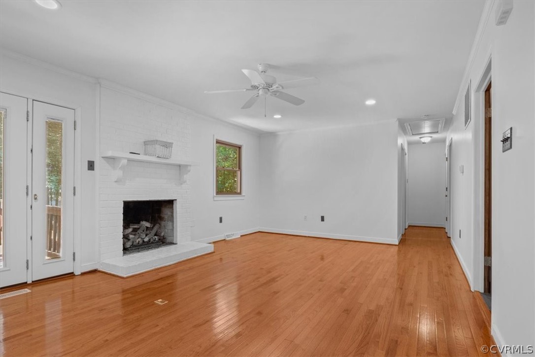 13919 Barnes Spring Road Midlothian, VA 23112 - Photo 12 of 25 a view of empty room with a fireplace