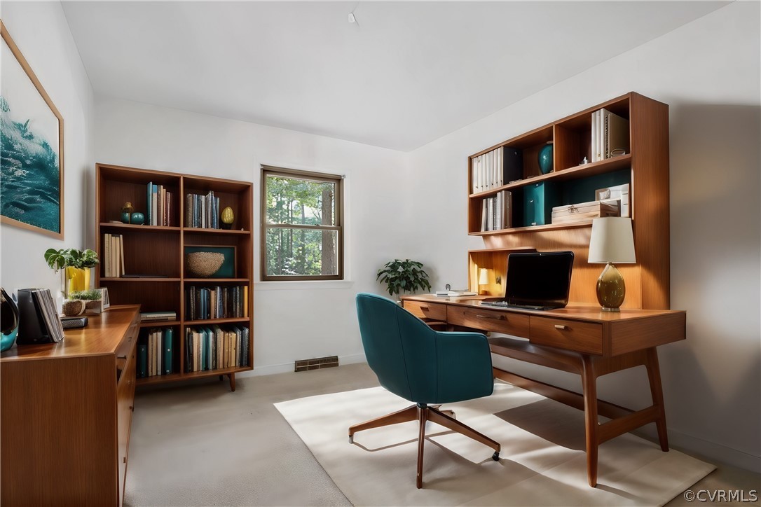 13919 Barnes Spring Road Midlothian, VA 23112 - Photo 15 of 25 a workspace with a bookshelf
