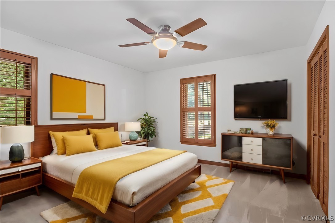13919 Barnes Spring Road Midlothian, VA 23112 - Photo 17 of 25 a bedroom with a bed and a flat screen tv on dresser