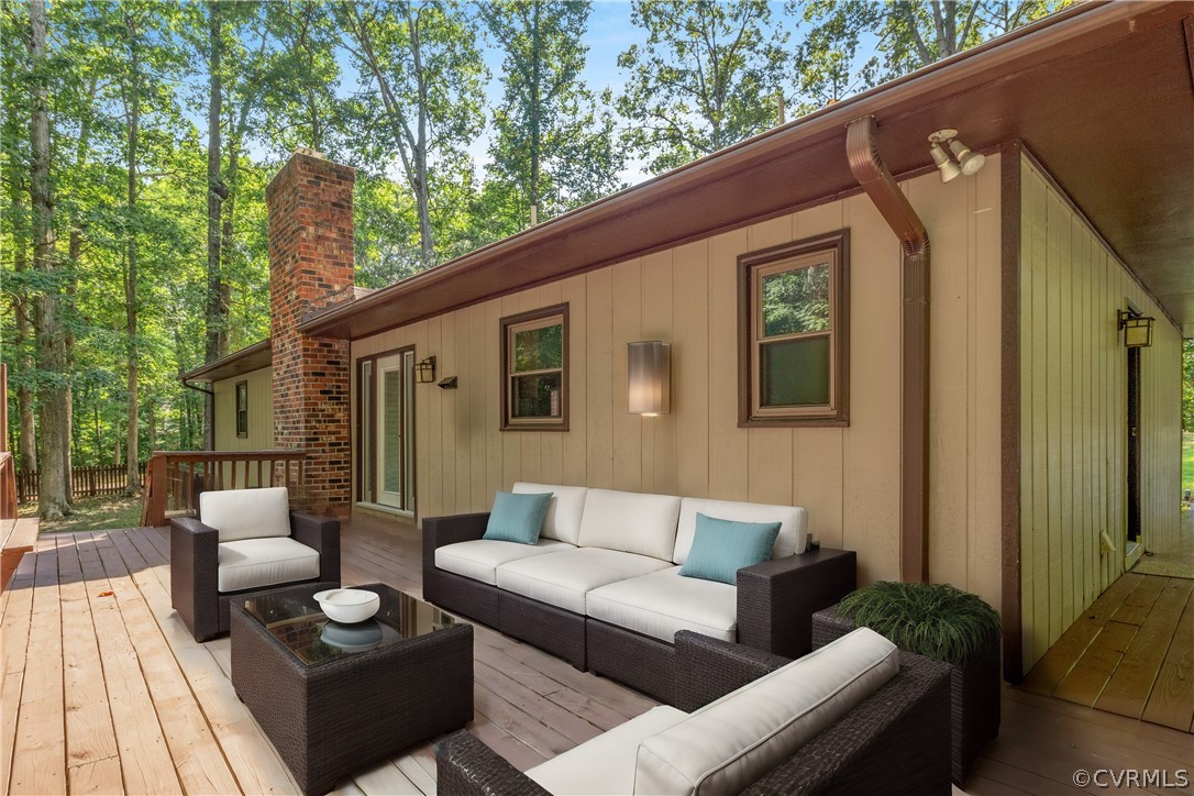 13919 Barnes Spring Road Midlothian, VA 23112 - Photo 19 of 25 a outdoor living space with furniture and garden view