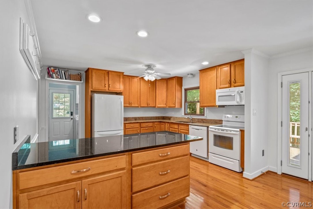 13919 Barnes Spring Road Midlothian, VA 23112 - Photo 4 of 25 a kitchen with granite countertop white cabinets and white appliances