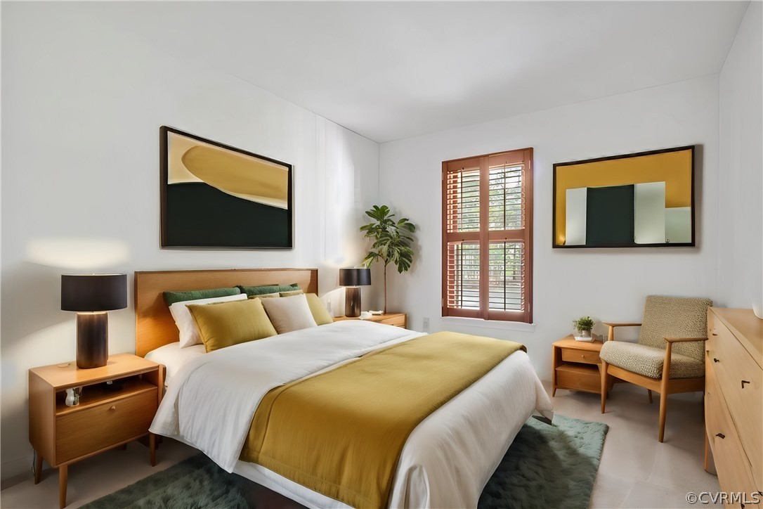 13919 Barnes Spring Road Midlothian, VA 23112 - Photo 6 of 25 a bedroom with a bed and a flat screen tv