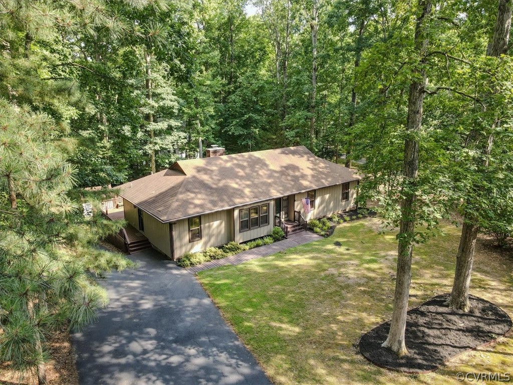13919 Barnes Spring Road Midlothian, VA 23112 - Photo 8 of 25 a view of a house with garden