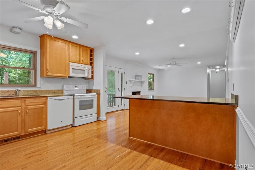 13919 Barnes Spring Road Midlothian, VA 23112 - Photo 10 of 25 a large kitchen with stainless steel appliances granite countertop a stove a sink and a refrigerator