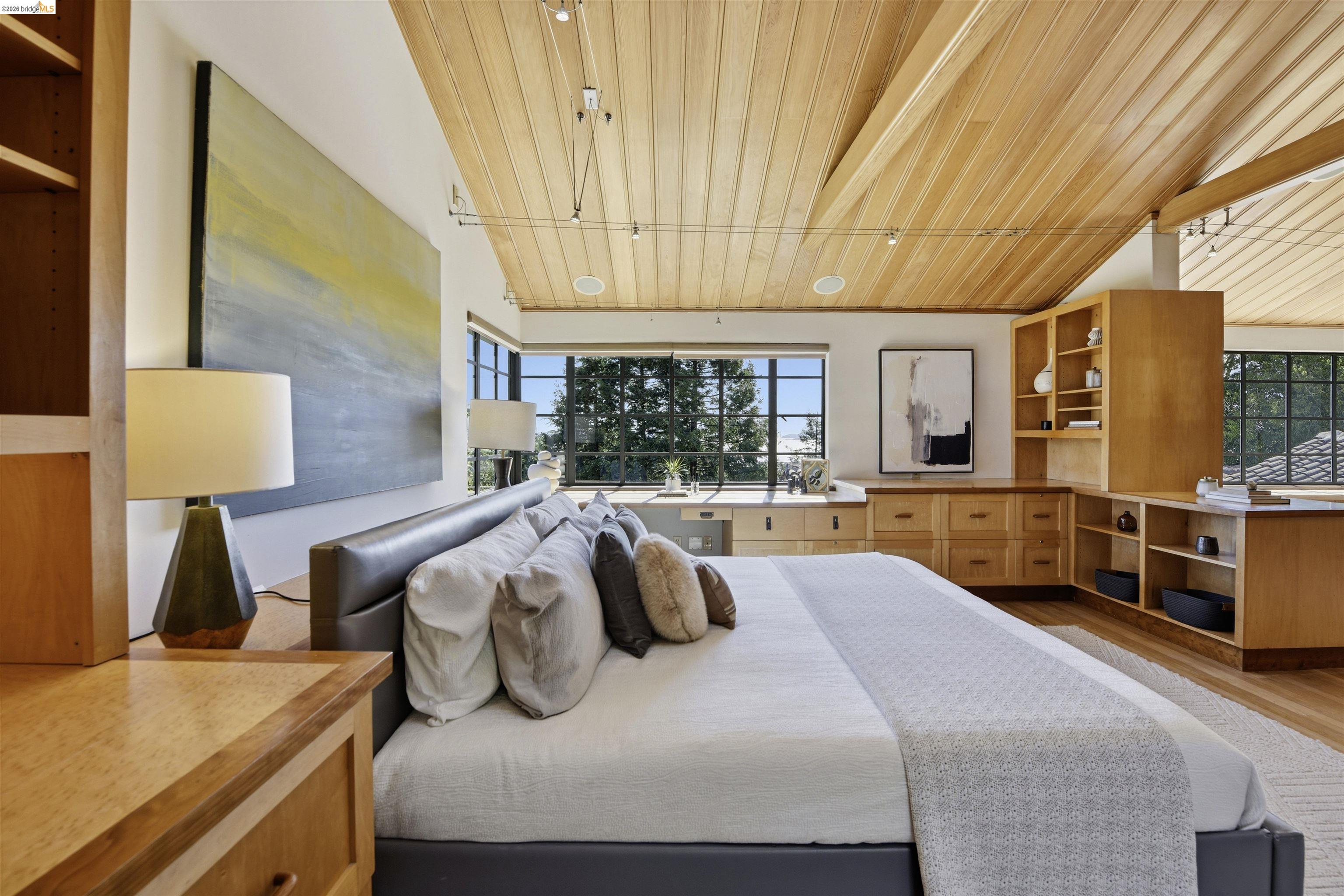 44 Highgate Road Kensington, CA 94707 - Photo 25 of 83 a bedroom with a large bed and a large window