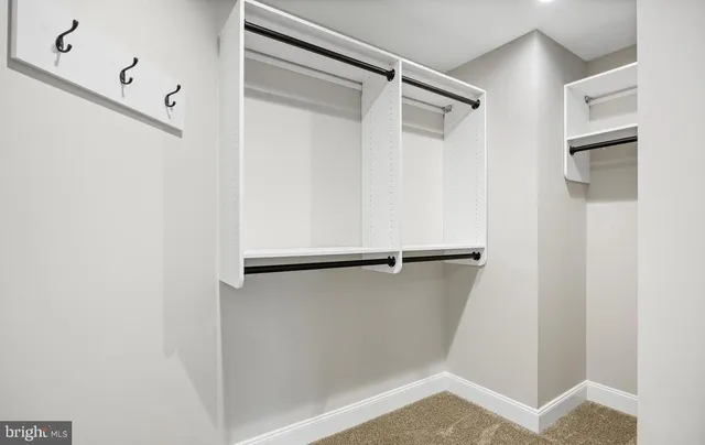 a view of an empty walk in closet