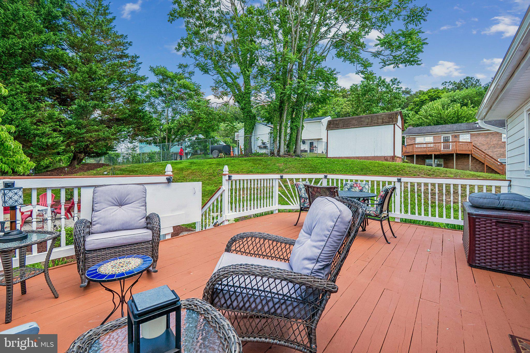 7610 Bentree Road Fort Washington, MD 20744 - Photo 25 of 25 Charming deck with lush green views.