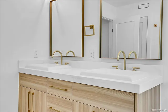 a white bath tub sitting next to a window