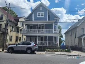 a car parked in front of a building