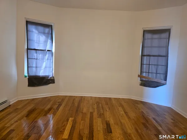 an empty room with windows