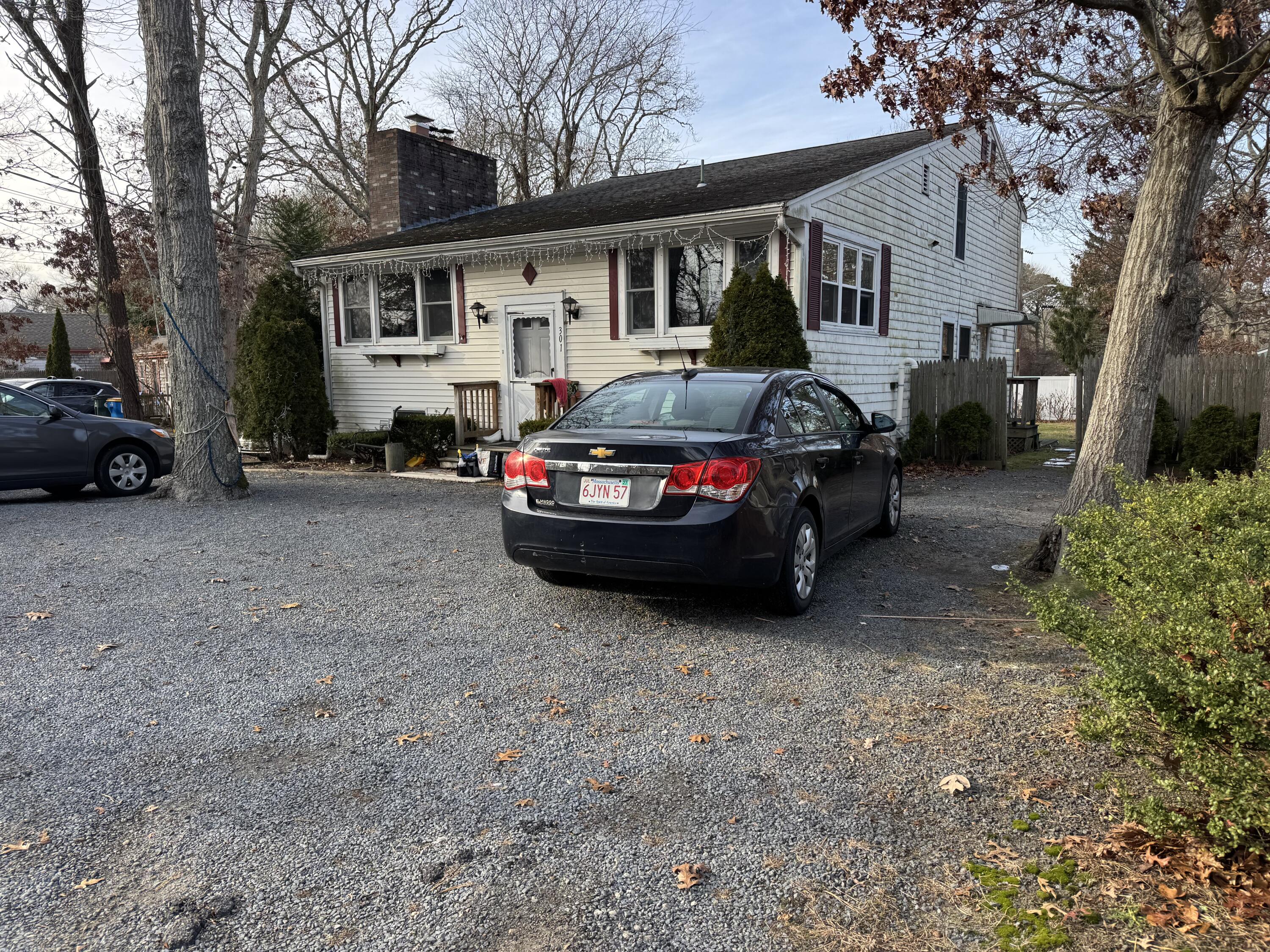 a car parked in front of a house