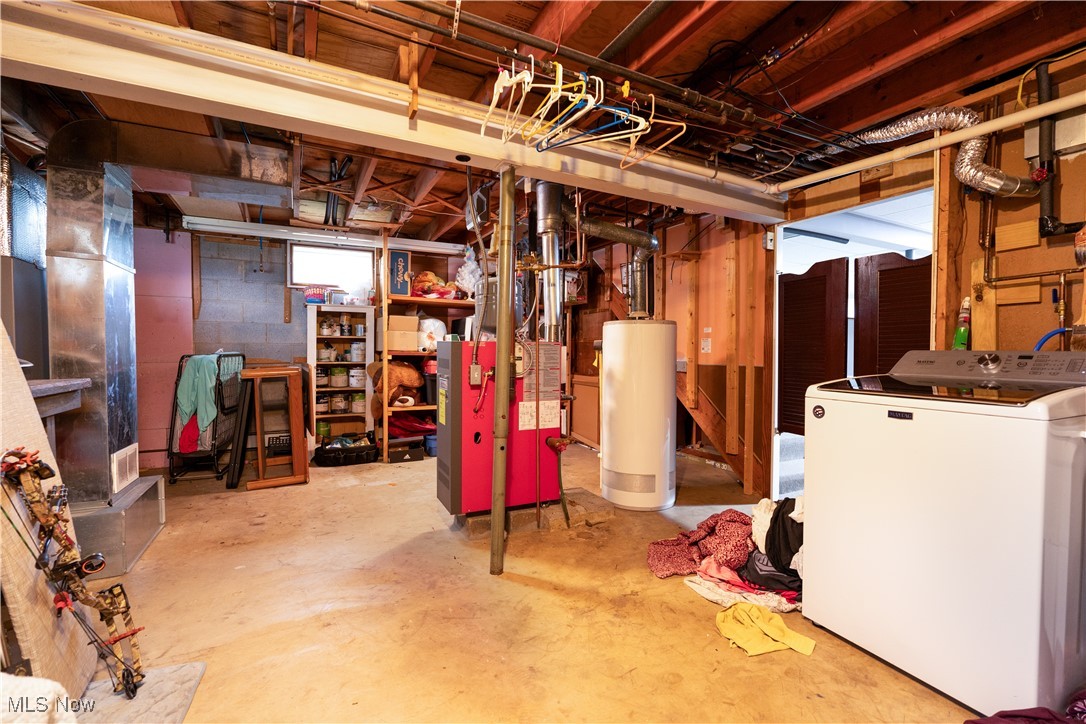 659 Lake Road Conneaut, OH 44030 - Photo 15 of 24 Basement featuring gas water heater, washer / clothes dryer, and heating unit