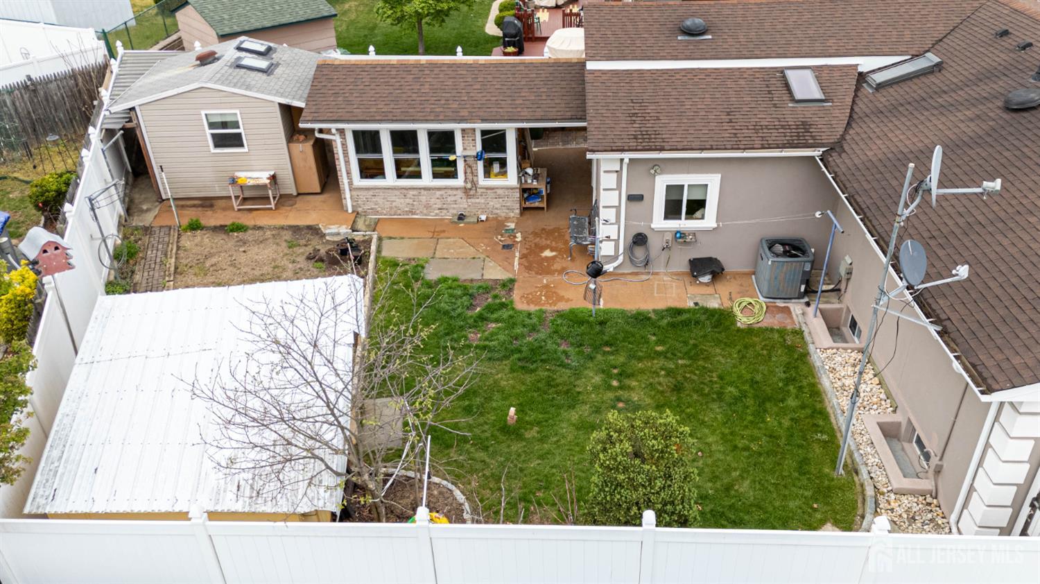 95 Pinetree Drive Sayreville, NJ 08859 - Photo 11 of 12 front view of a house with a yard