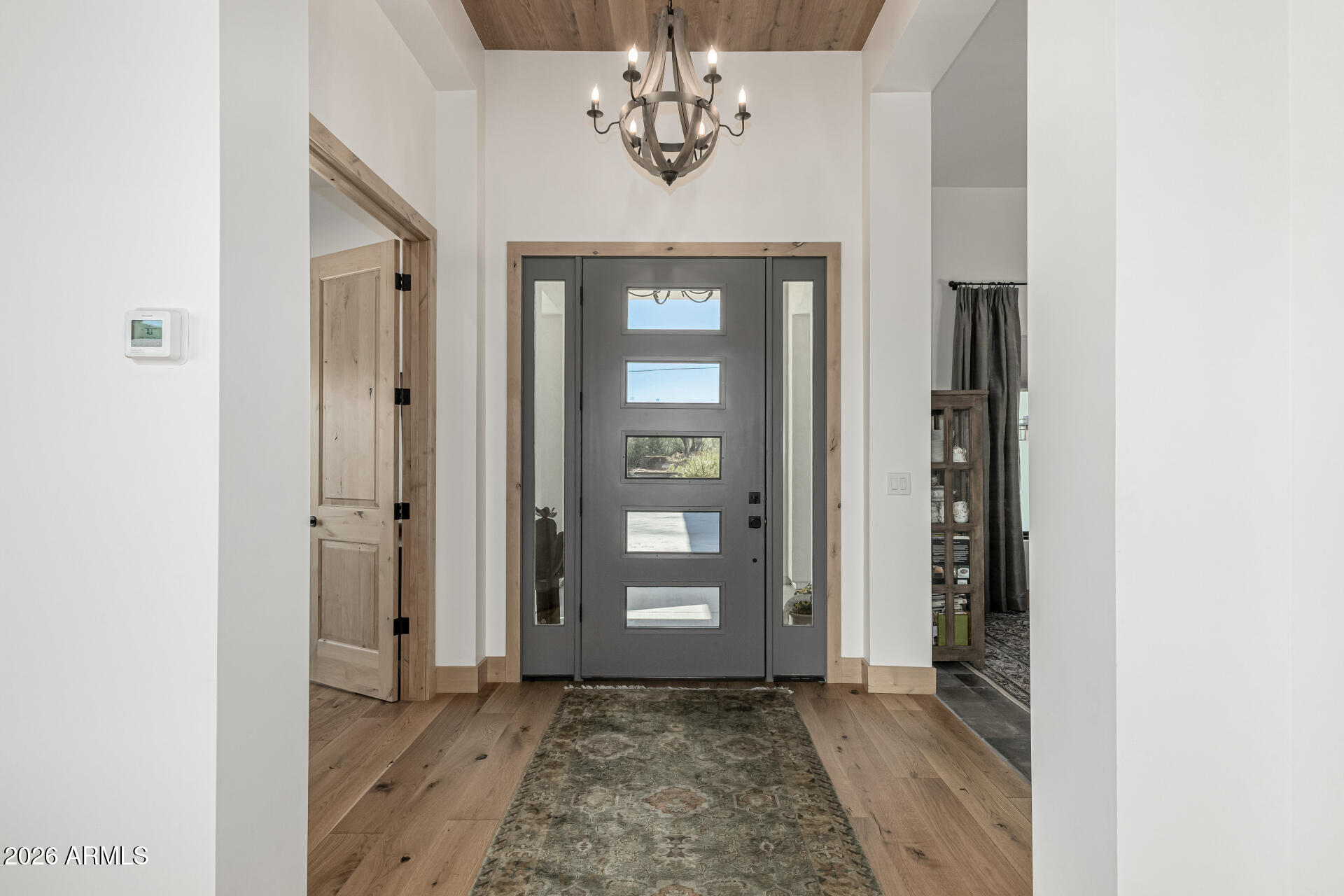 31210 North 68th Street Cave Creek, AZ 85331 - Photo 11 of 61 a view of an entryway with a chandelier